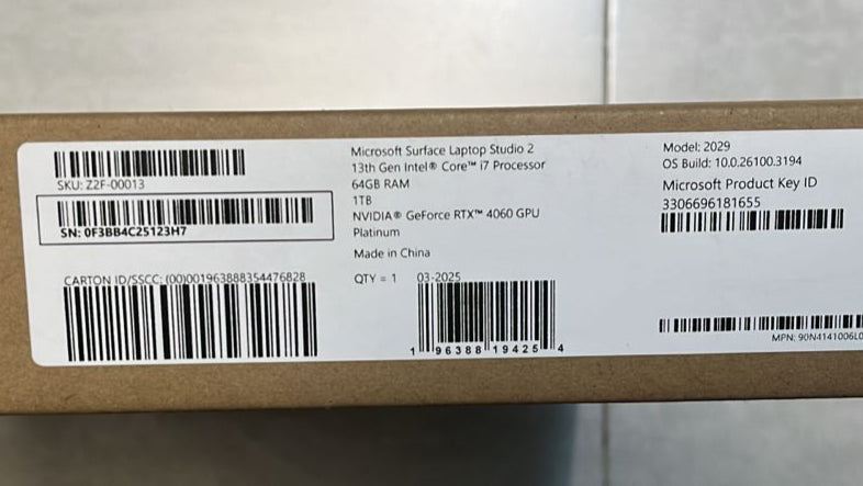 Cardboard box with a barcode label on a reflective surface